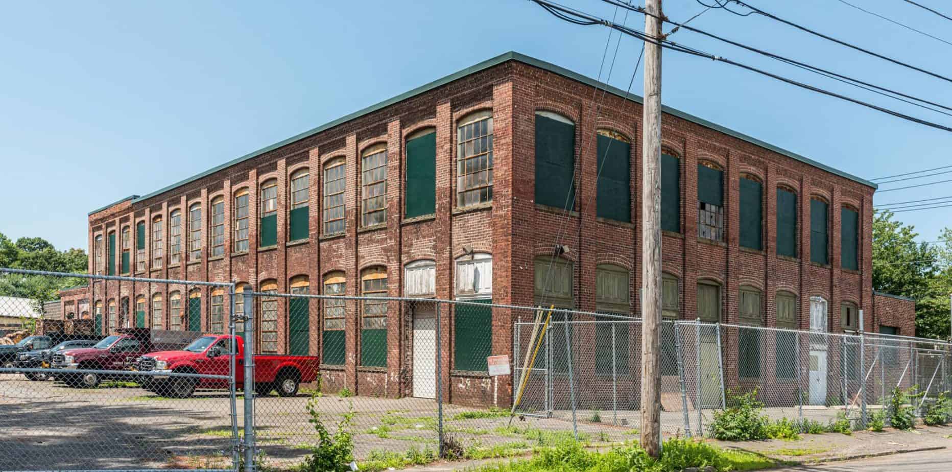 Photo 3. 2 Merritt Place, view northwest showing south elevation and facade.